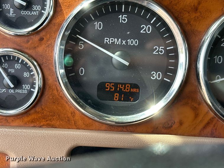 image for item EG1384 2009 Peterbilt  365 tri-drive bucket truck