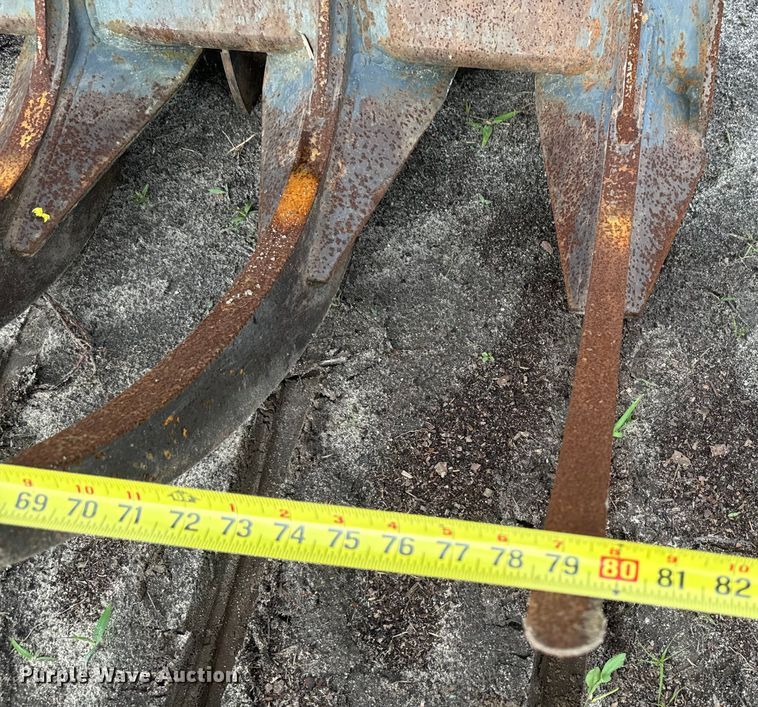 image for item EH5411 Rake Shop skid steer grapple bucket