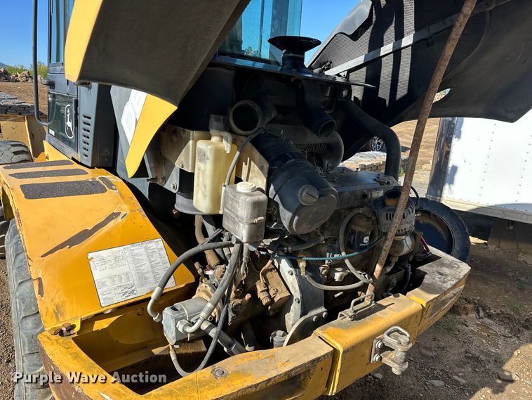 image for item OM9466 2008 John Deere  304J wheel loader