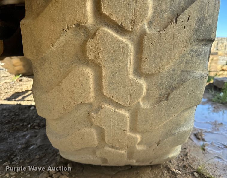 image for item OM9466 2008 John Deere  304J wheel loader