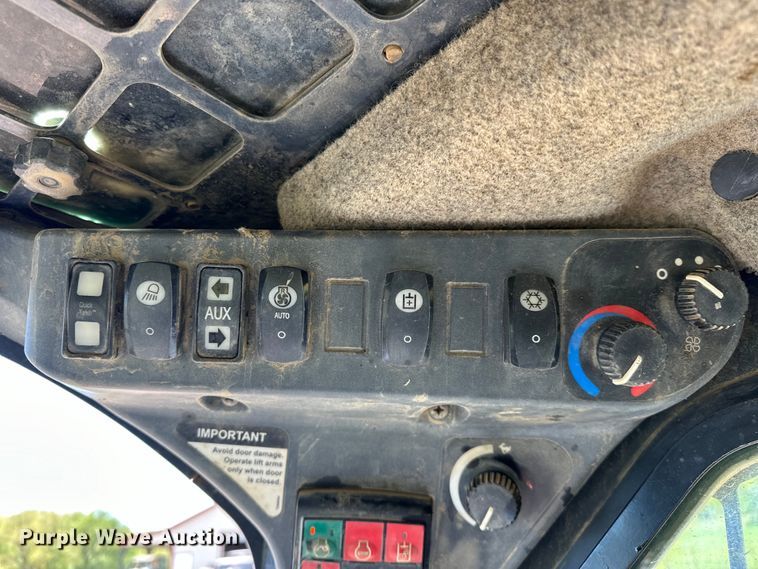 image for item OM9470 2015 John Deere  332E skid steer loader