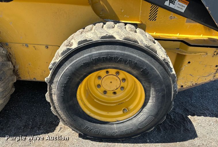 image for item OM9470 2015 John Deere  332E skid steer loader