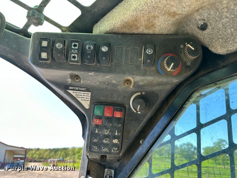 image for item OM9471 2016 John Deere  332E  skid steer loader