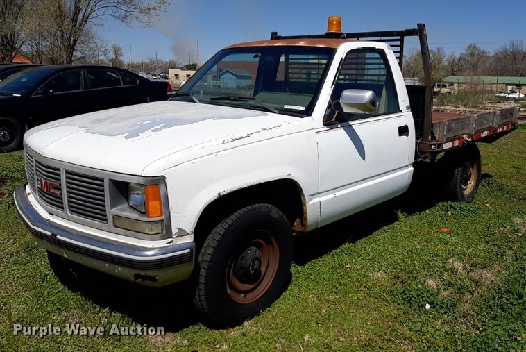 image for item DV9957 1989 GMC Sierra C2500 flatbed pickup truck