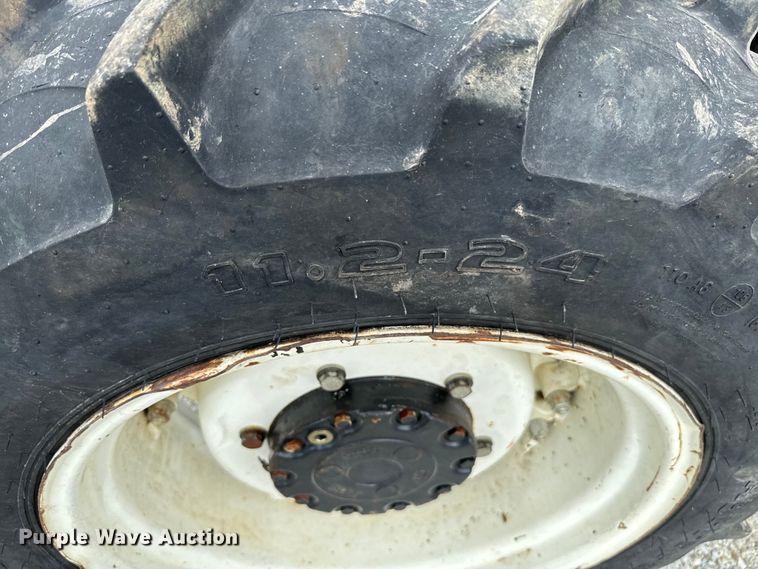 image for item EJ0403 2006 New Holland TN75A MFWD tractor