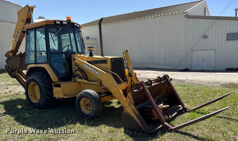 image for item NH9174 1993 John Deere 310D backhoe