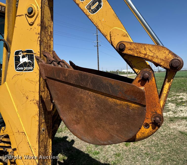 image for item NH9174 1993 John Deere 310D backhoe