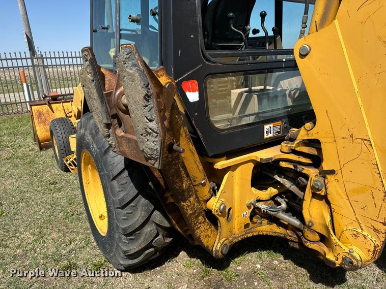 image for item NH9174 1993 John Deere 310D backhoe