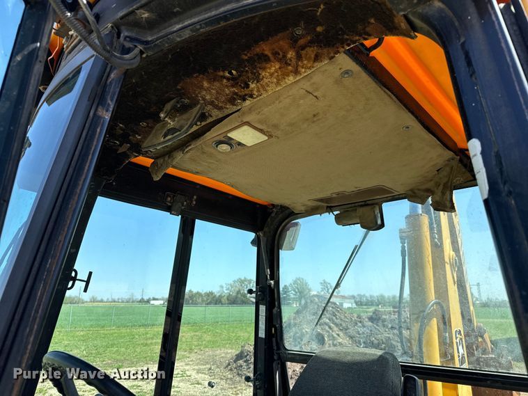 image for item NH9174 1993 John Deere 310D backhoe