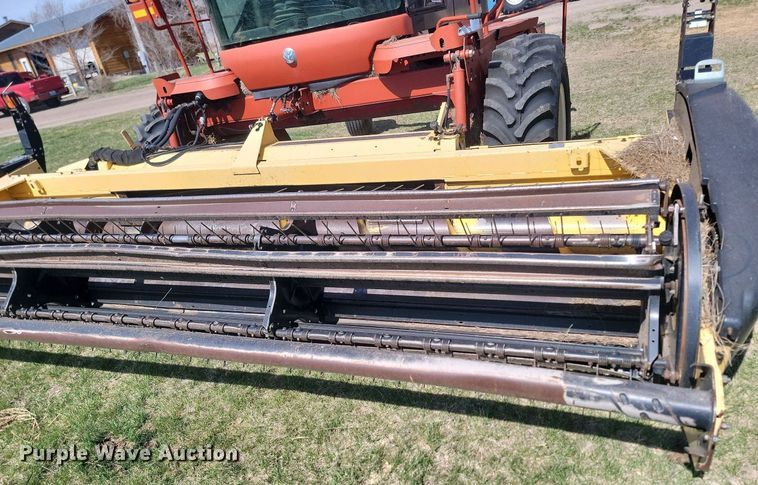 image for item DP3526 2005 New Holland  HW325 swather / windrower