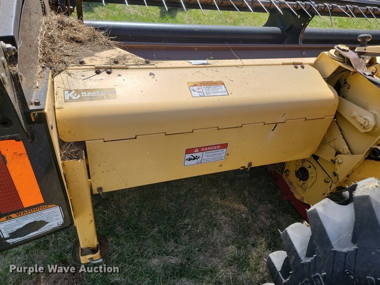 image for item DP3526 2005 New Holland  HW325 swather / windrower