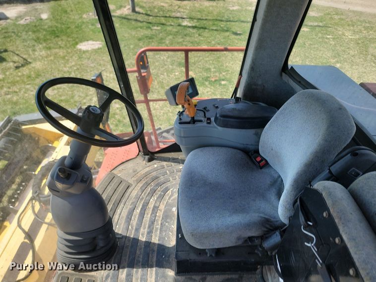 image for item DP3526 2005 New Holland  HW325 swather / windrower