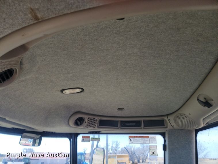 image for item DP3526 2005 New Holland  HW325 swather / windrower