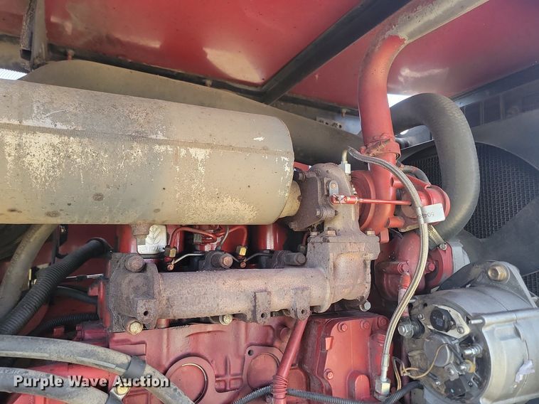 image for item DP3526 2005 New Holland  HW325 swather / windrower