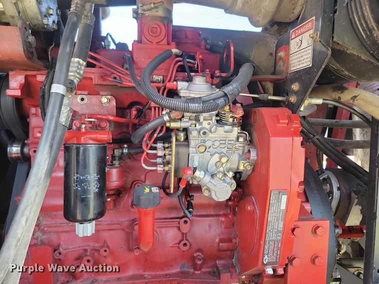 image for item DP3526 2005 New Holland  HW325 swather / windrower