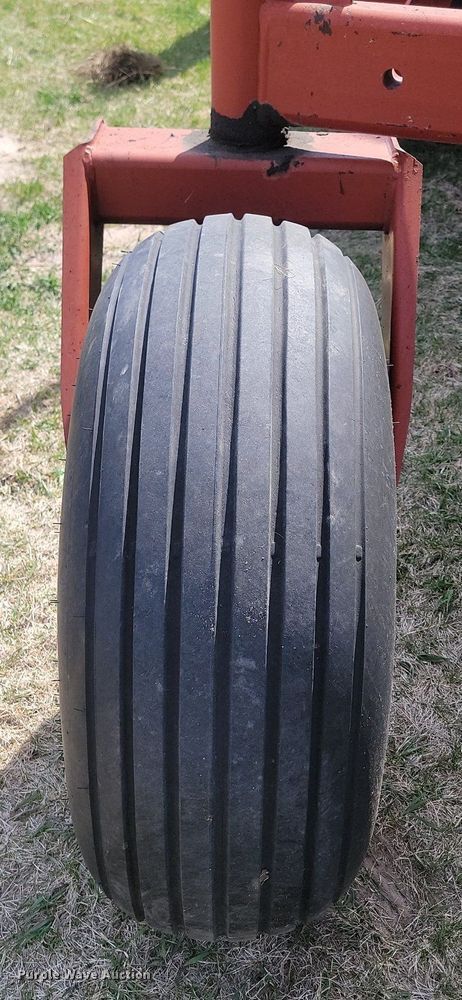 image for item DP3526 2005 New Holland  HW325 swather / windrower