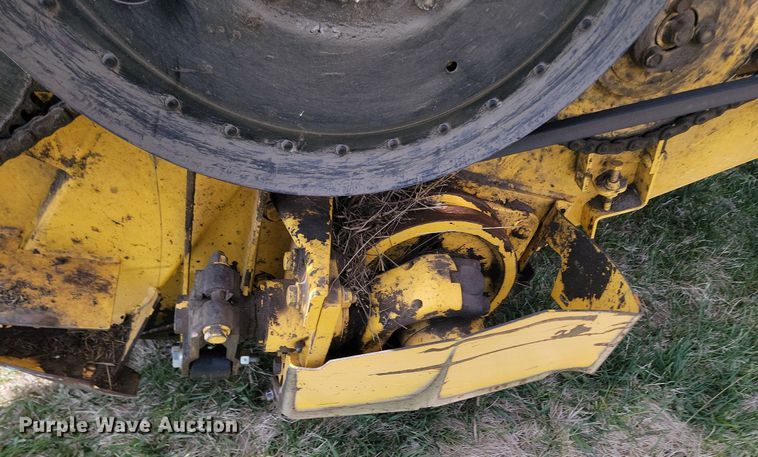 image for item DP3526 2005 New Holland  HW325 swather / windrower