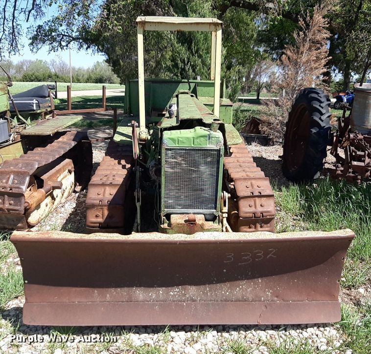 image for item DQ7011 1952 John Deere MC tractor