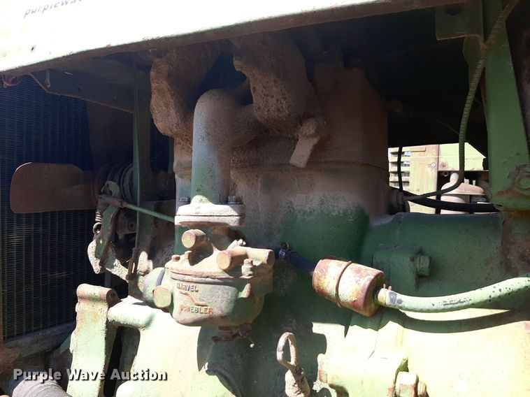 image for item DQ7011 1952 John Deere MC tractor