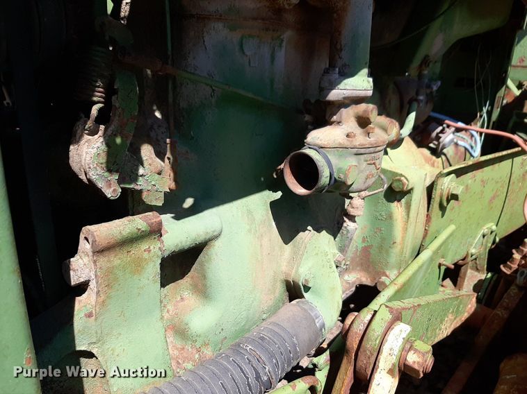 image for item DQ7011 1952 John Deere MC tractor