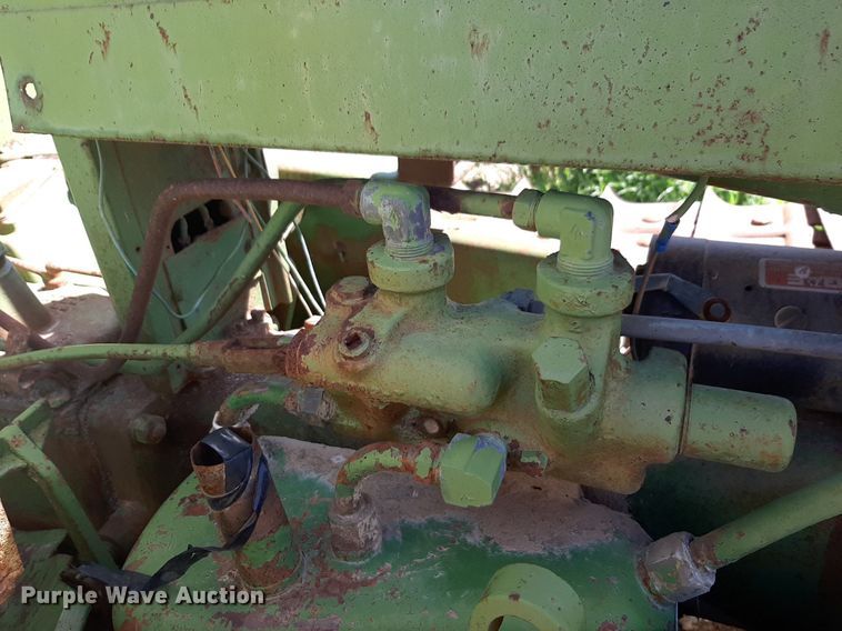 image for item DQ7011 1952 John Deere MC tractor