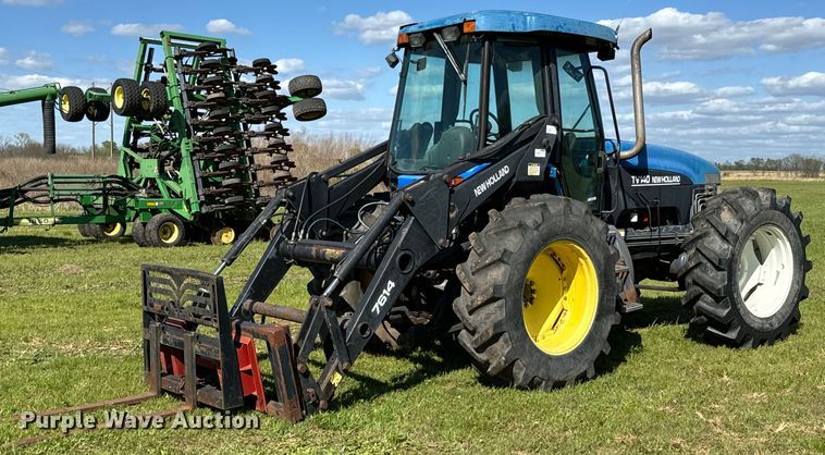 image for item ND9219 1999 New Holland TV140 bi-directional tractor