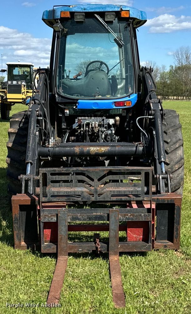 image for item ND9219 1999 New Holland TV140 bi-directional tractor