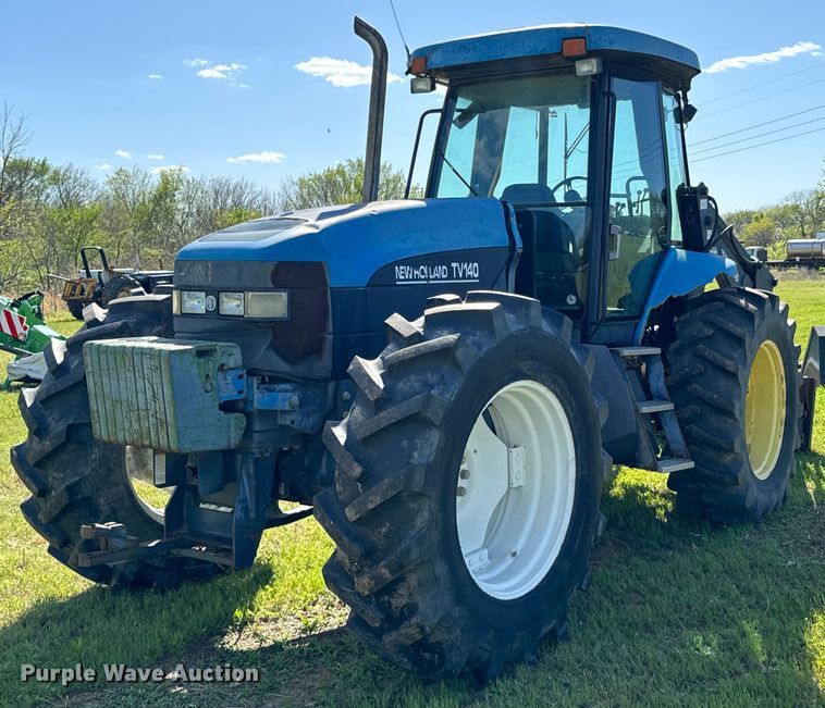 image for item ND9219 1999 New Holland TV140 bi-directional tractor