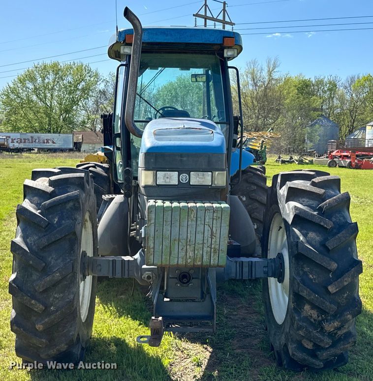 image for item ND9219 1999 New Holland TV140 bi-directional tractor
