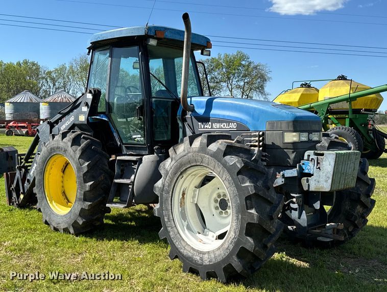 image for item ND9219 1999 New Holland TV140 bi-directional tractor