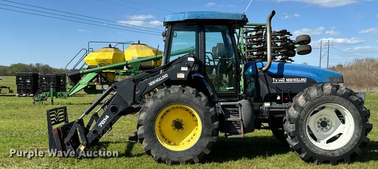 image for item ND9219 1999 New Holland TV140 bi-directional tractor