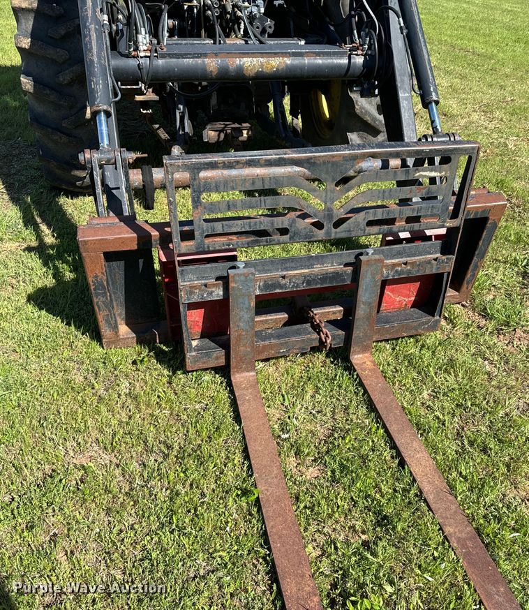 image for item ND9219 1999 New Holland TV140 bi-directional tractor