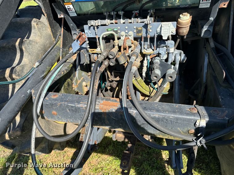 image for item ND9219 1999 New Holland TV140 bi-directional tractor