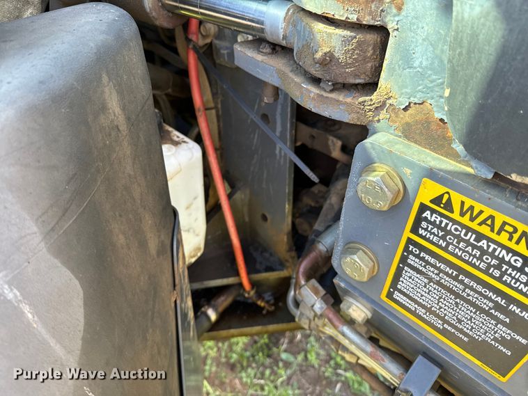 image for item ND9219 1999 New Holland TV140 bi-directional tractor