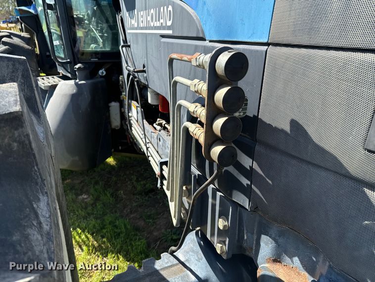 image for item ND9219 1999 New Holland TV140 bi-directional tractor