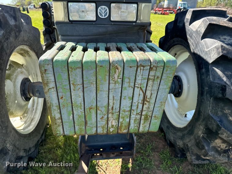 image for item ND9219 1999 New Holland TV140 bi-directional tractor