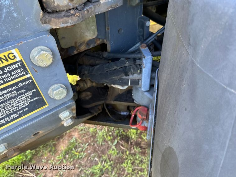 image for item ND9219 1999 New Holland TV140 bi-directional tractor