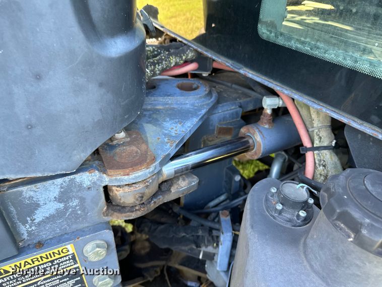 image for item ND9219 1999 New Holland TV140 bi-directional tractor