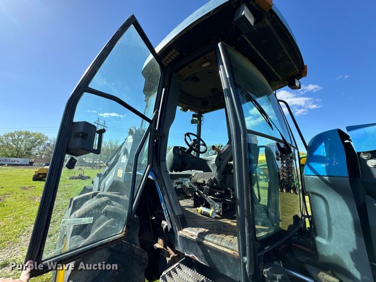 image for item ND9219 1999 New Holland TV140 bi-directional tractor