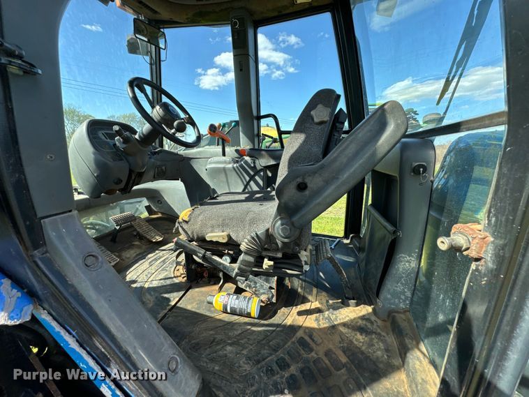 image for item ND9219 1999 New Holland TV140 bi-directional tractor