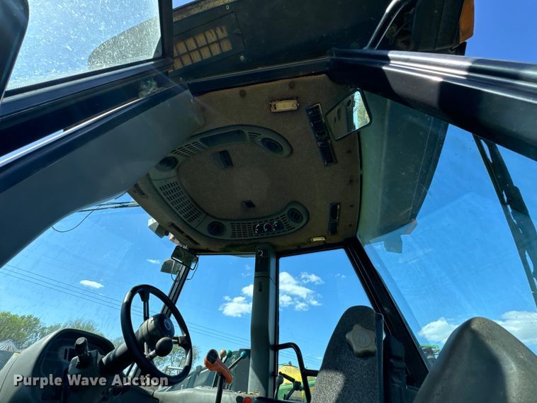 image for item ND9219 1999 New Holland TV140 bi-directional tractor