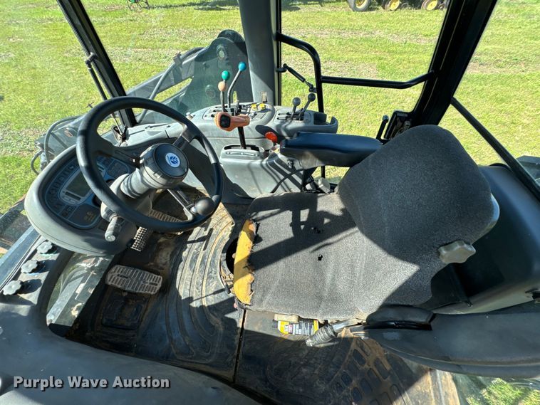 image for item ND9219 1999 New Holland TV140 bi-directional tractor