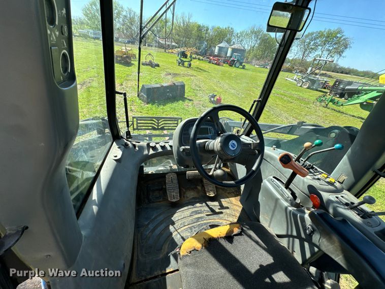 image for item ND9219 1999 New Holland TV140 bi-directional tractor