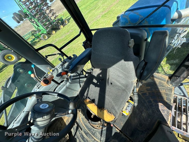 image for item ND9219 1999 New Holland TV140 bi-directional tractor