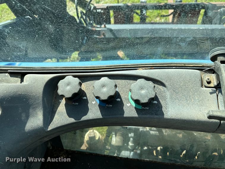 image for item ND9219 1999 New Holland TV140 bi-directional tractor