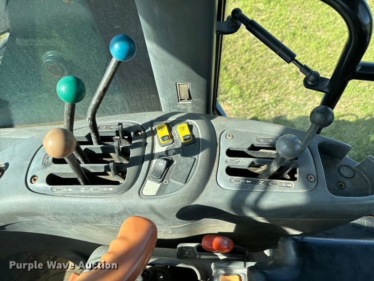 image for item ND9219 1999 New Holland TV140 bi-directional tractor