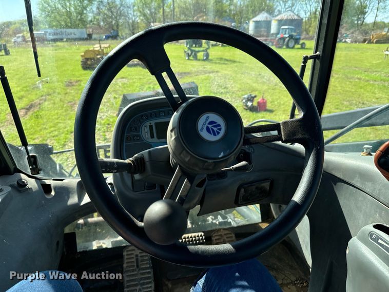 image for item ND9219 1999 New Holland TV140 bi-directional tractor