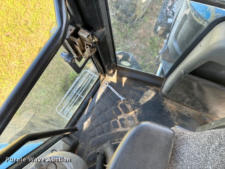 image for item ND9219 1999 New Holland TV140 bi-directional tractor