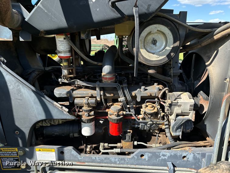 image for item ND9219 1999 New Holland TV140 bi-directional tractor