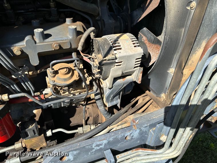 image for item ND9219 1999 New Holland TV140 bi-directional tractor